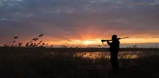 Chasseur et arme a feu